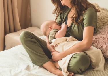 Mother breastfeeding her child